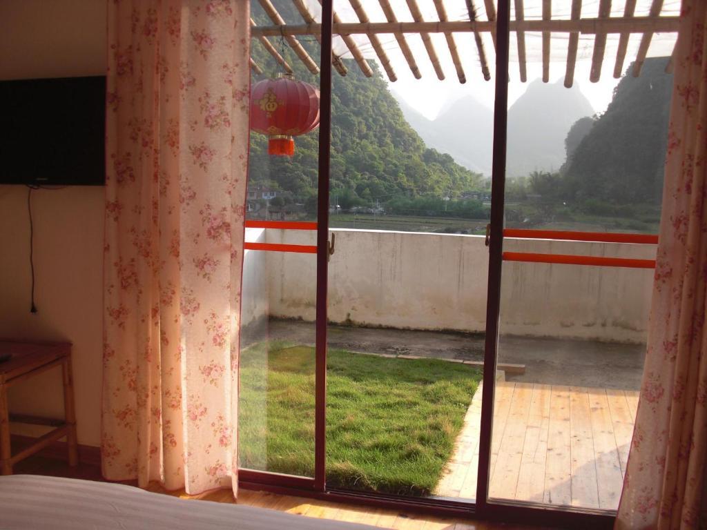 Huanggong Garden Hotel Yangshuo Kamer foto